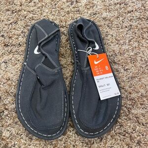 Men’s canvas Nike brand shoes size 8. New with tags.